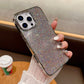 Phone case with rhinestone embellishments held by a hand